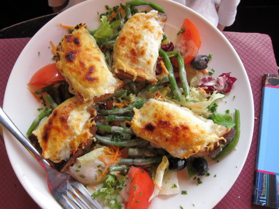 Salad with open faced grilled cheese 