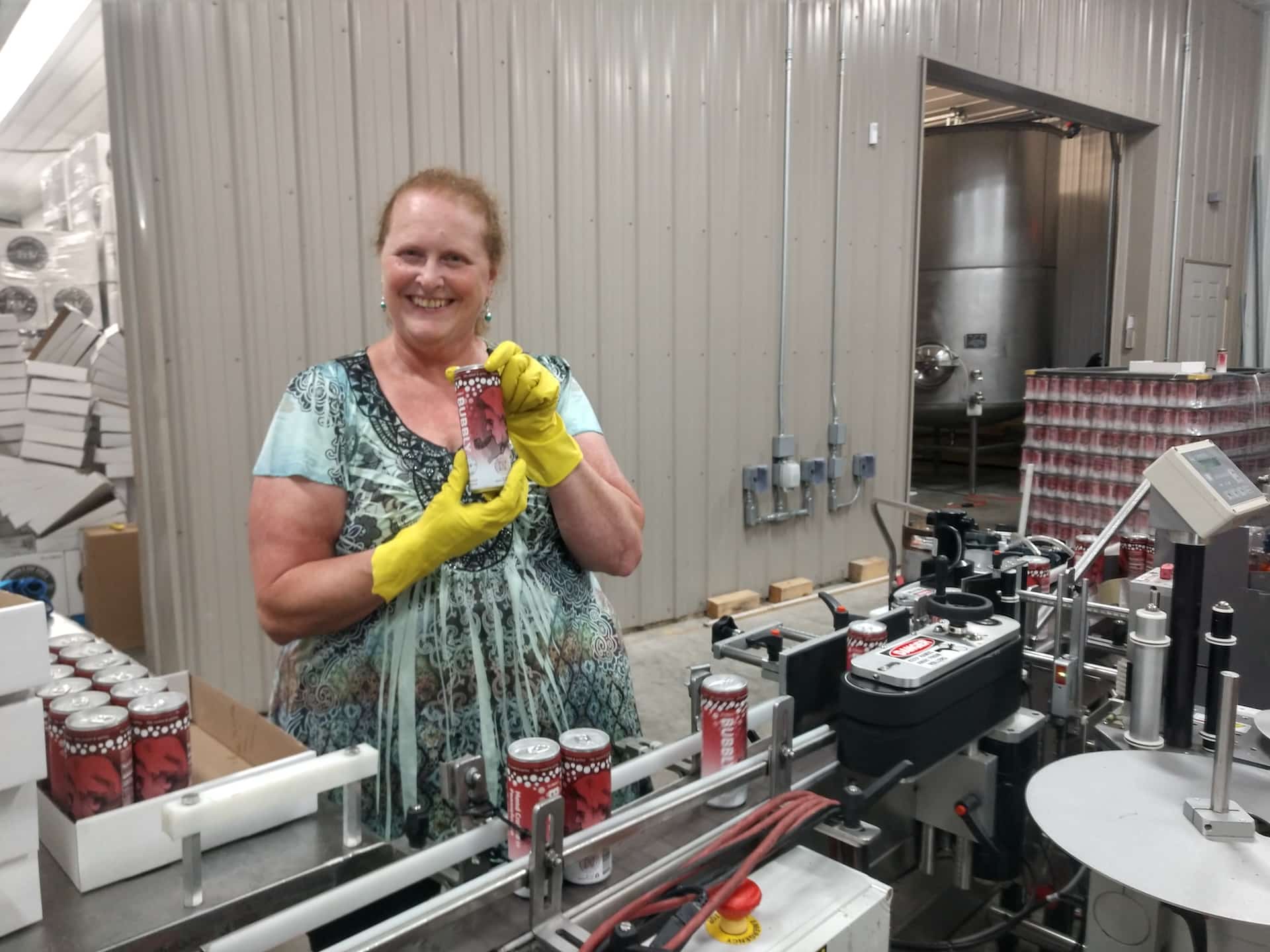 Bonnie Pyscher of Franklin Hill Vineyards at the canning line.