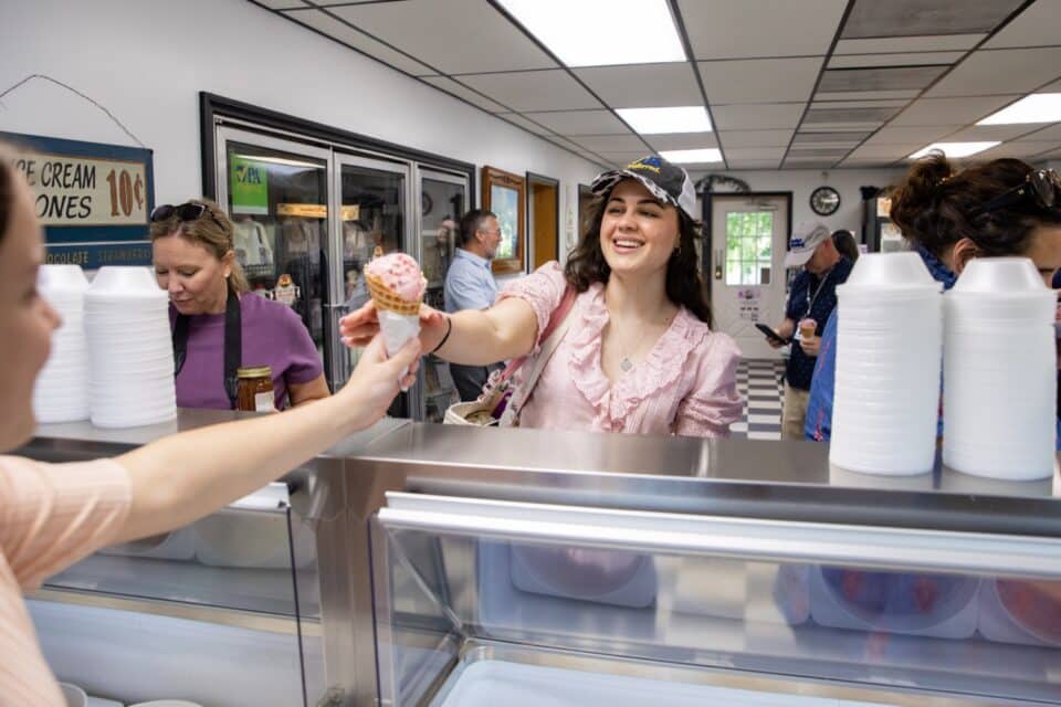 New Holland, PA. Grace Dunigan with the PA Dept. of Agriculture enjoying some ice cream at Lapp Valley Creamery. Pennsylvania Agriculture Secretary Russell Redding and Executive Director Burger officially launched the 2026 Scooped Ice Cream Trail at Lapp Valley Creamery in New Holland, Lancaster County. Now in its ninth year and bigger than ever, this year's program includes 59 PA Preferred creameries stretching from one end of Pennsylvania to the other. June 4, 2026.