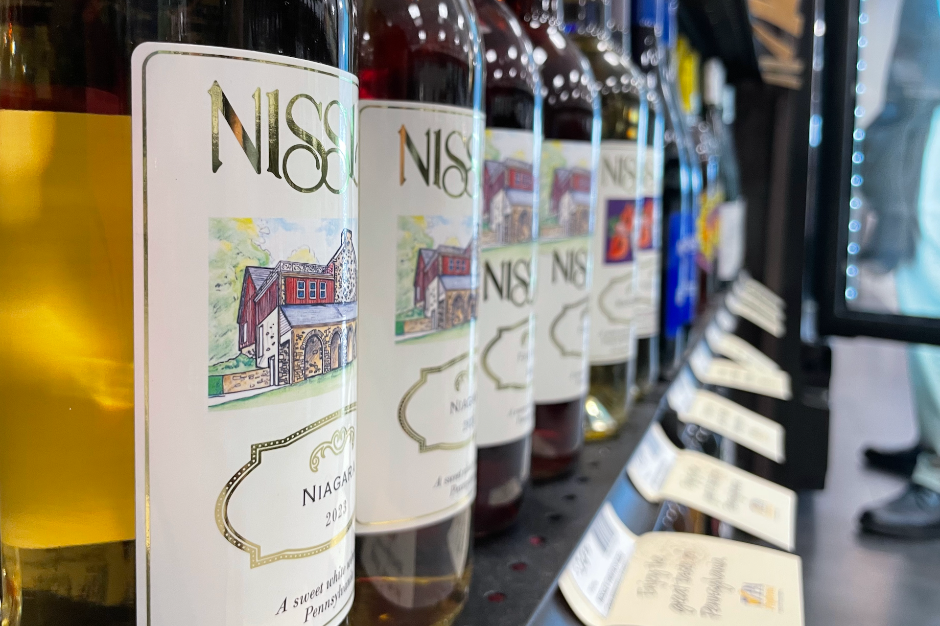 Wine labels from a side view.