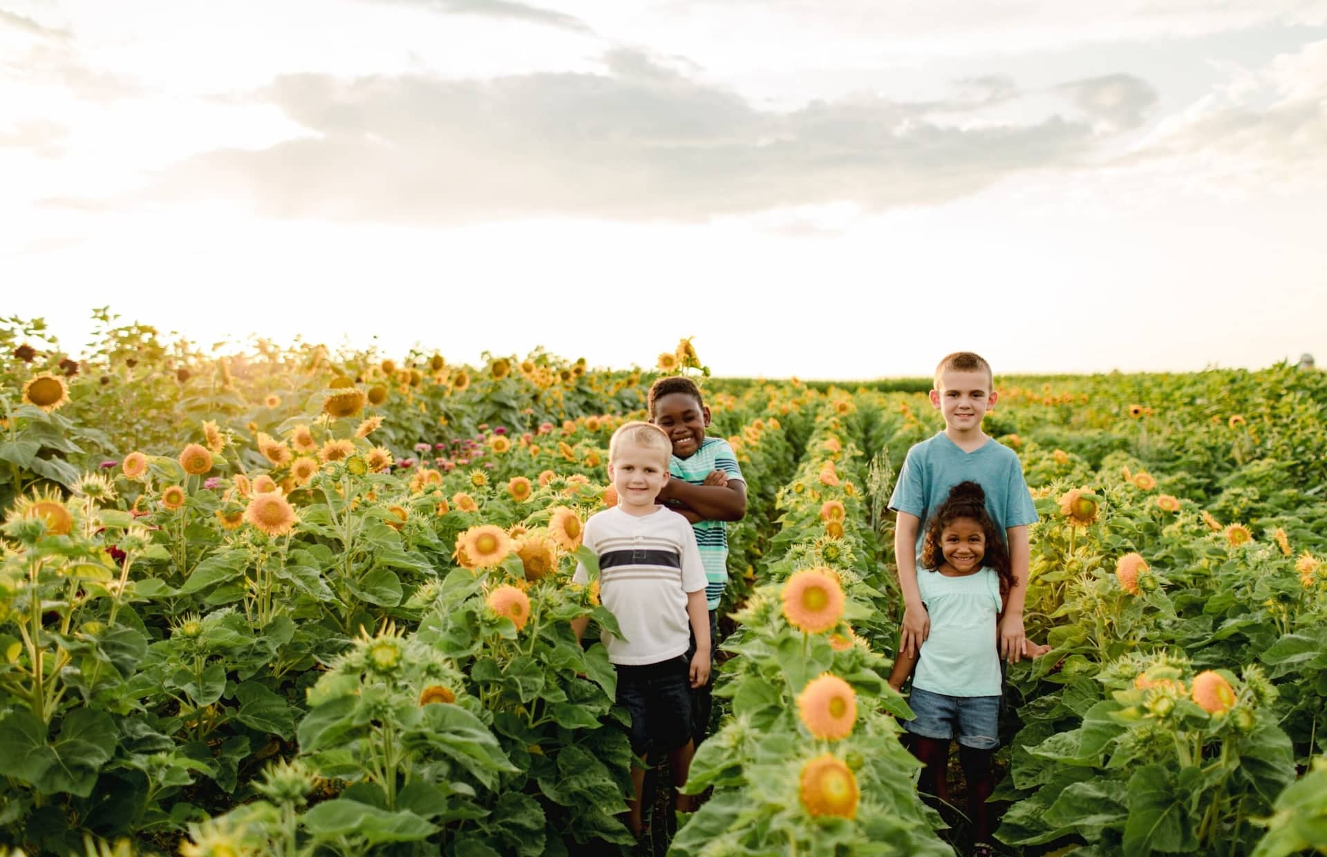 Young guests in the Oregon Dairy Farmstead sunflower patch.