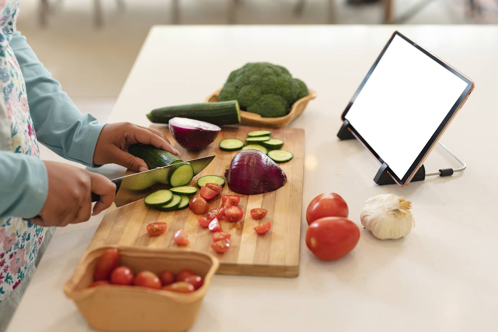 Learning to cook with a tablet.