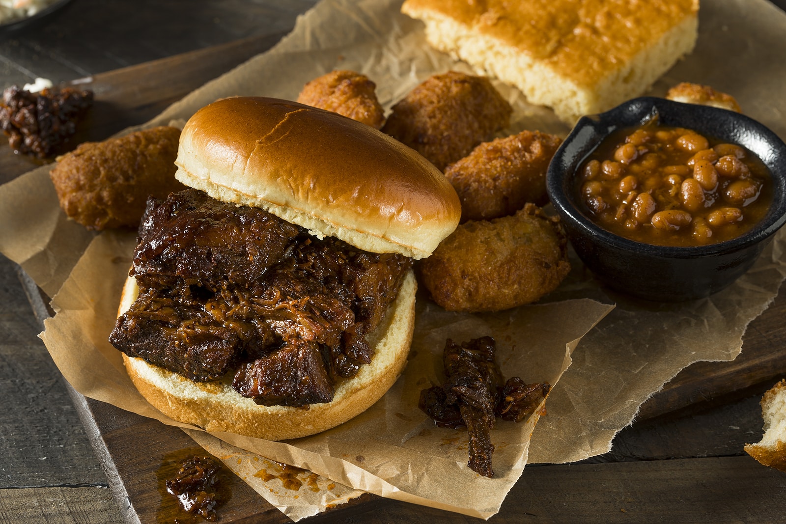 Slow Smoked Brisket Burnt Ends Sandwich with Sides.