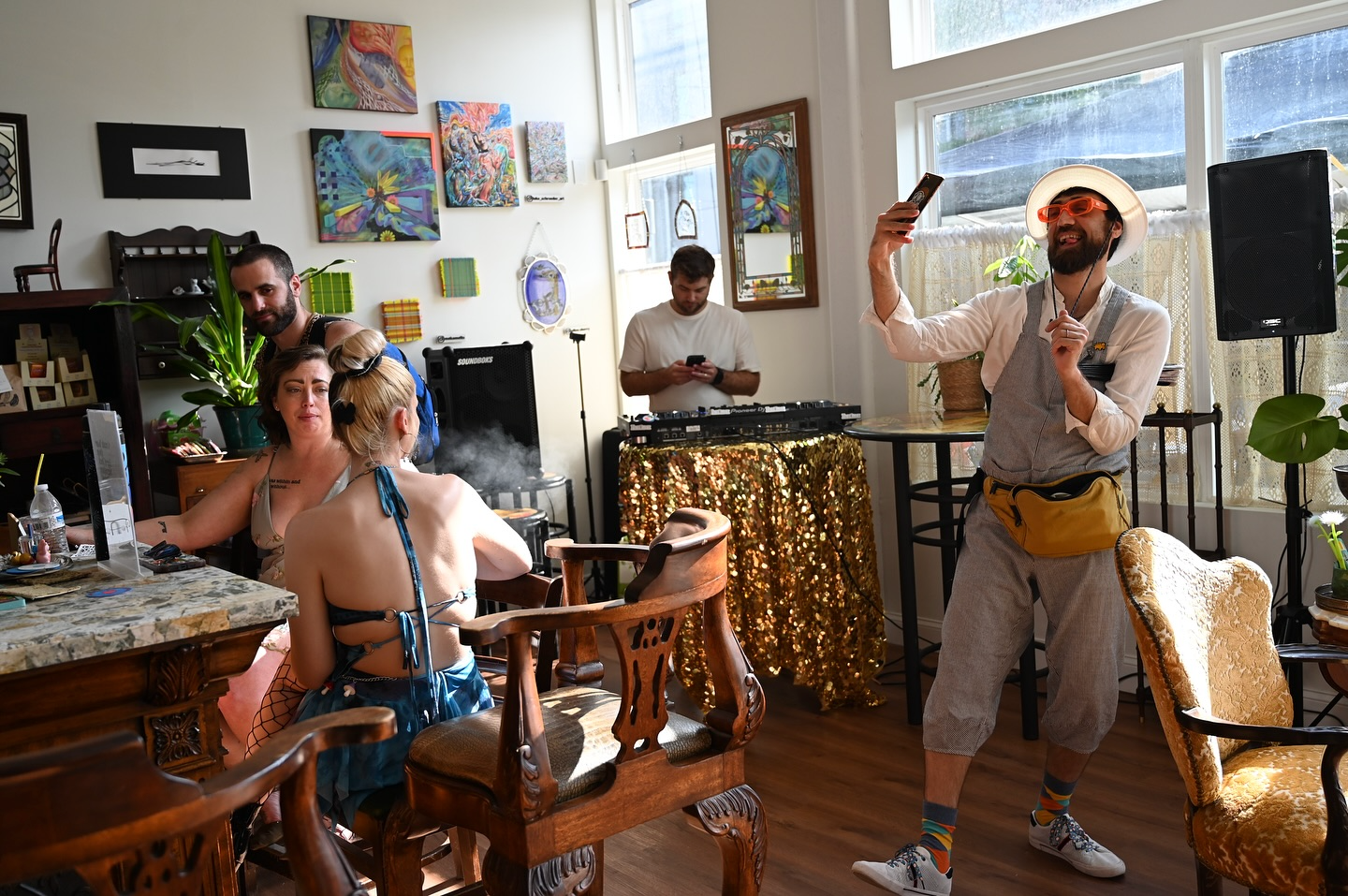 People hang out at FaceClock Gallery in Philadelphia.