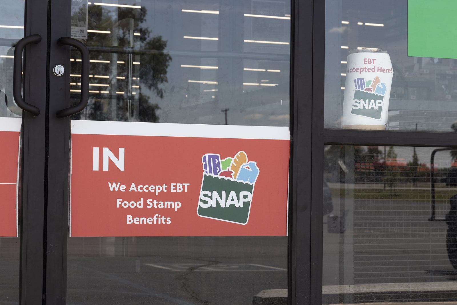 Tipton - Circa July 2022: SNAP and EBT Accepted here sign. SNAP and Food Stamps provide nutrition benefits to supplement the budgets of disadvantaged families.