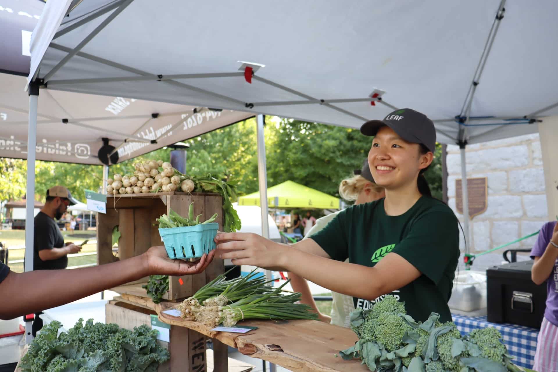 Jasmine of the LEAF Project at the market.