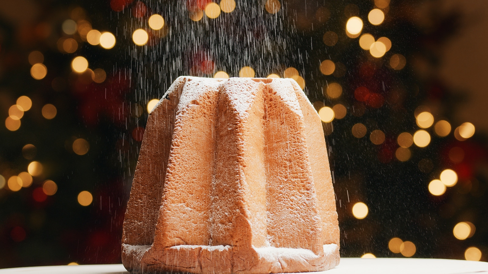 Pandoro and sugar for Christmas food Italian tradition.