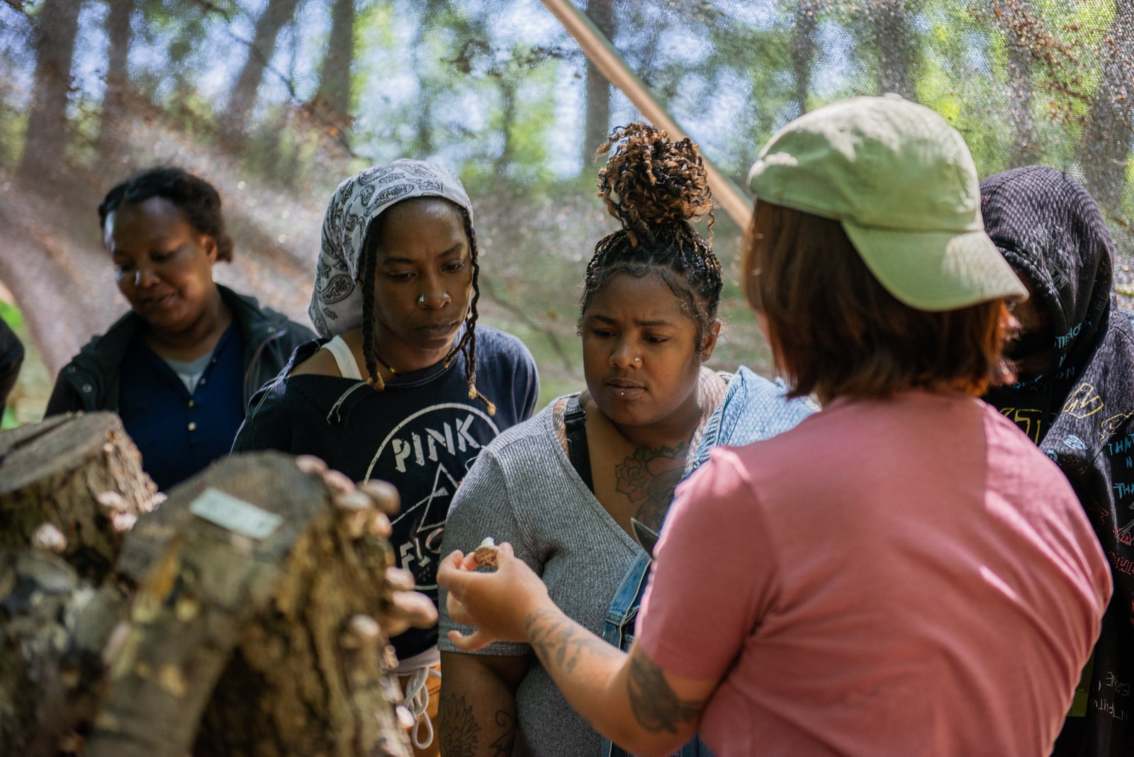 Philabundance Community Kitchen students tour the mushroom part of Carversville Farm Foundation.