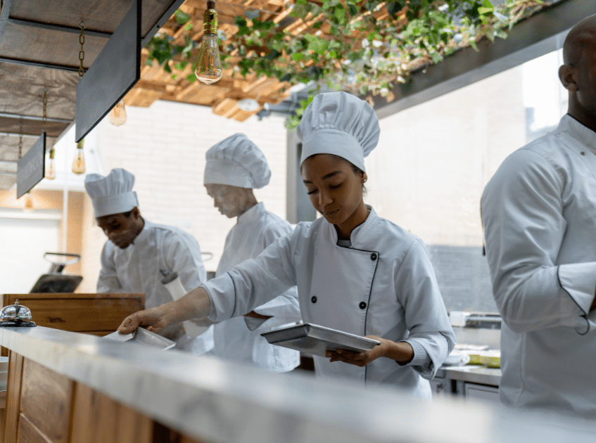 A group of chefs working together.