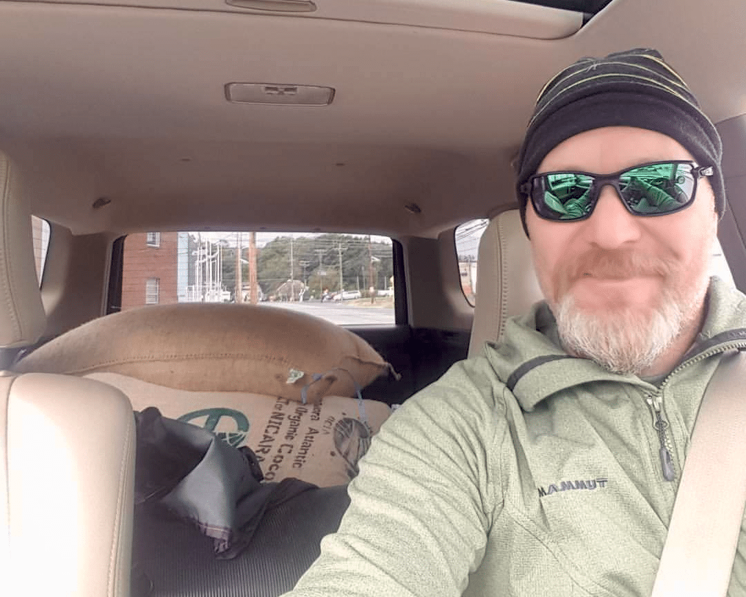 Robert Campbell picking up a shipment of organic cacao