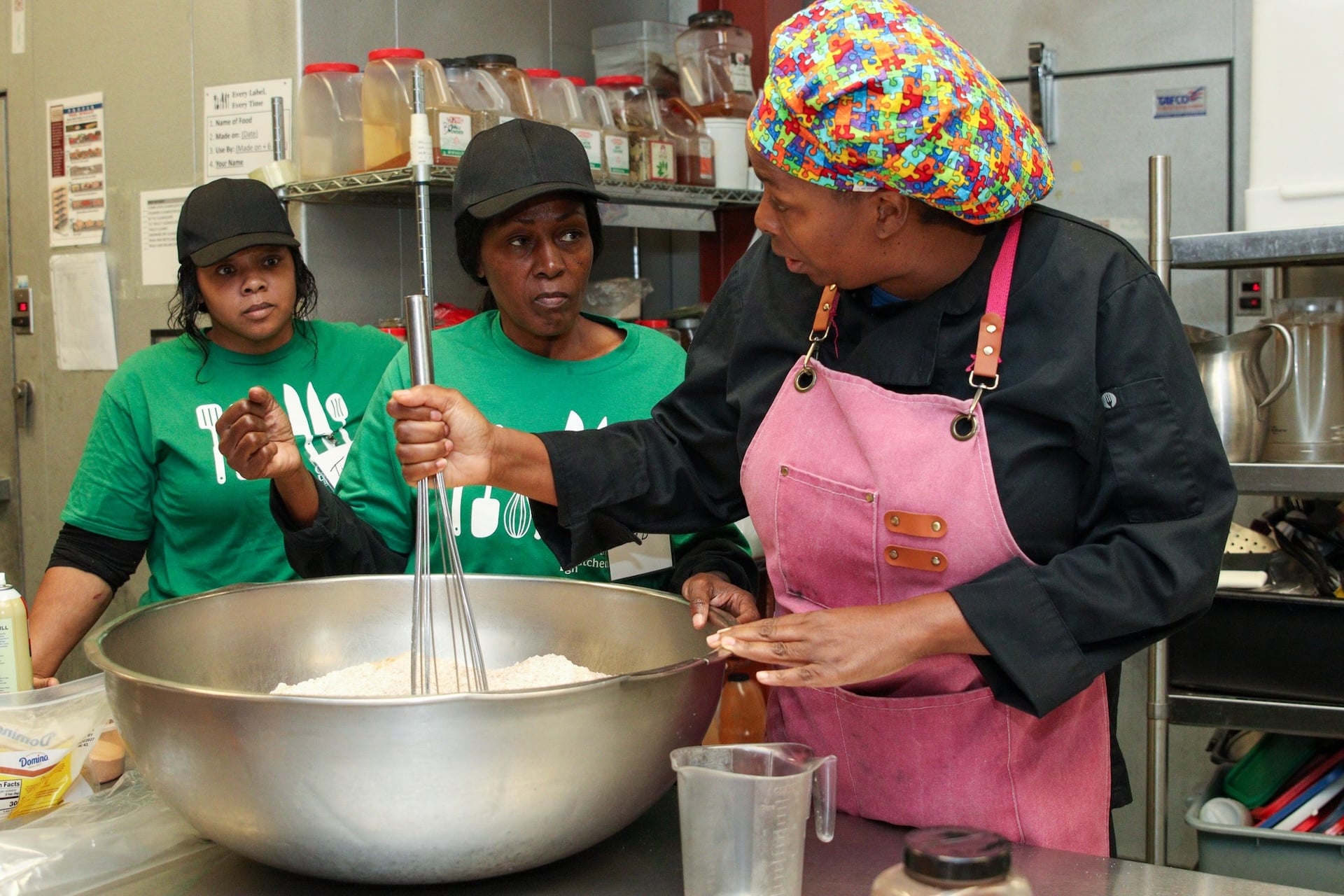 Community Kitchen PGH Chef Missy gives instructinos.