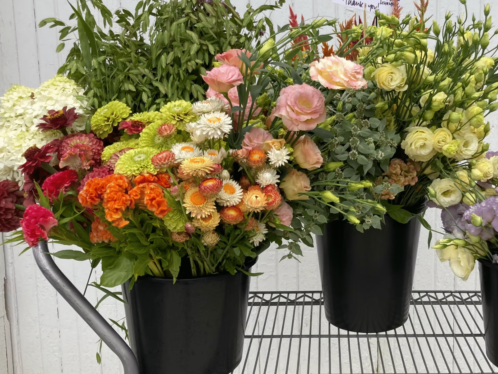 Party Buckets by Roots Cut Flower Farm.