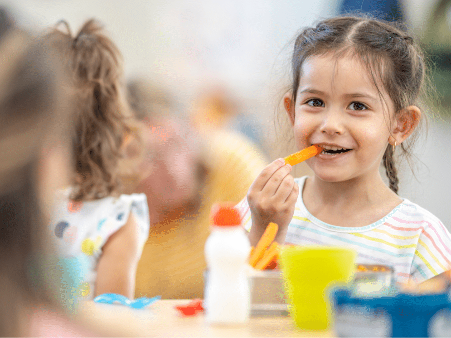 A girl eating lunch.