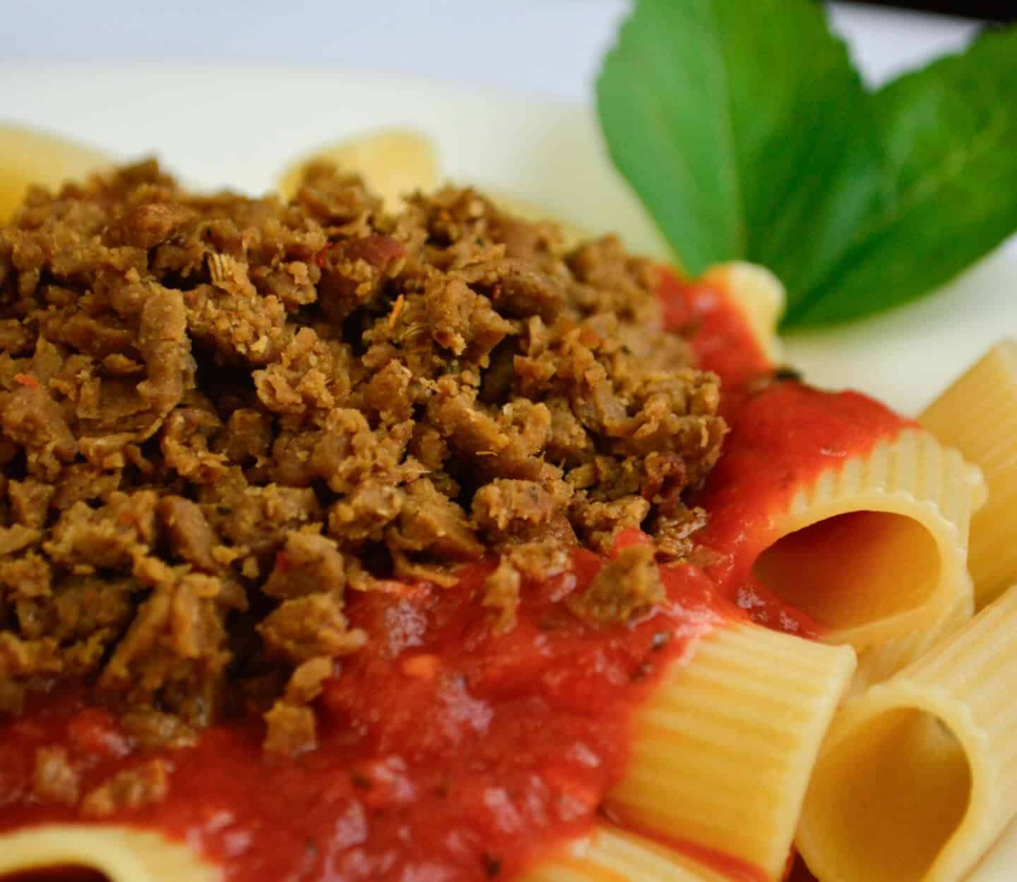 Self-Reliant Seitan ground sausage on pasta.