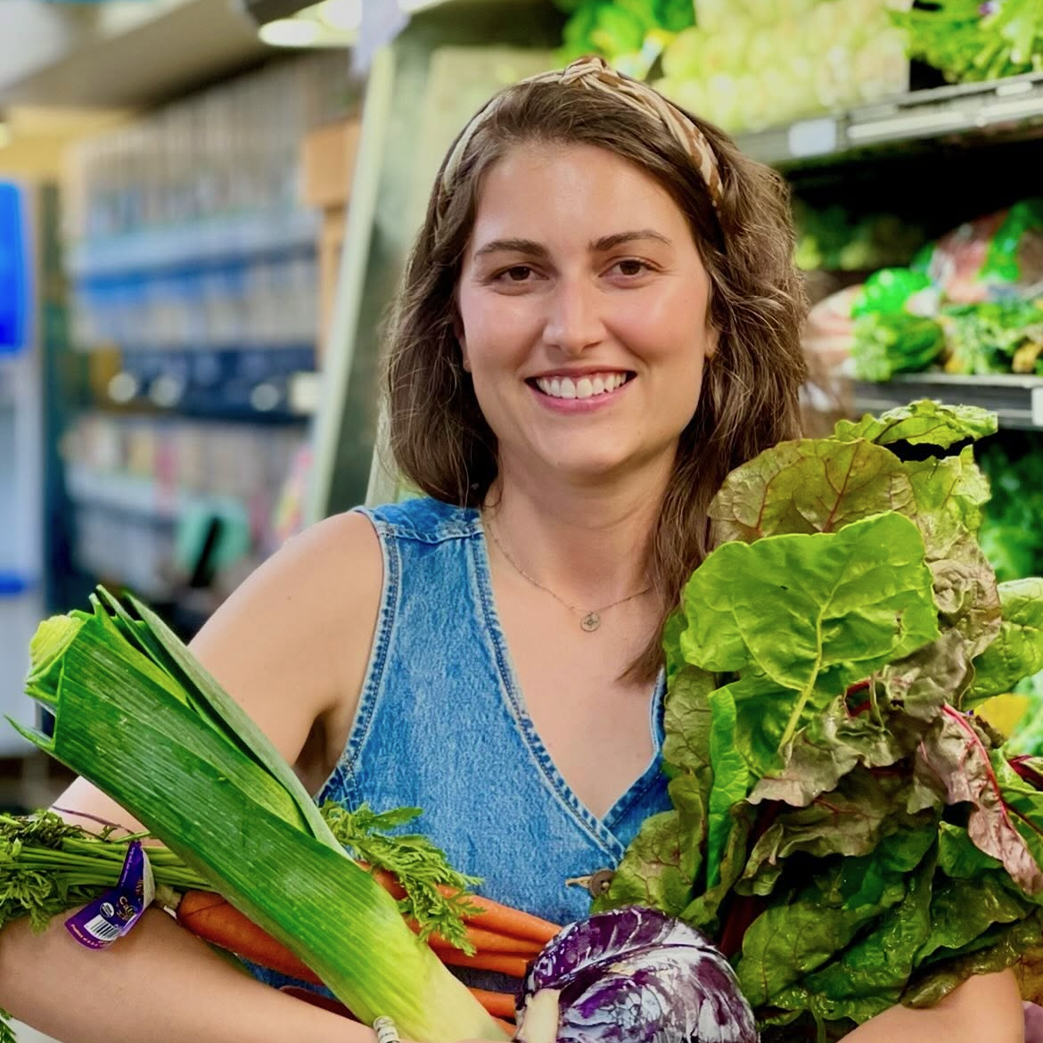 An armful of produce at East End Food Co-op.